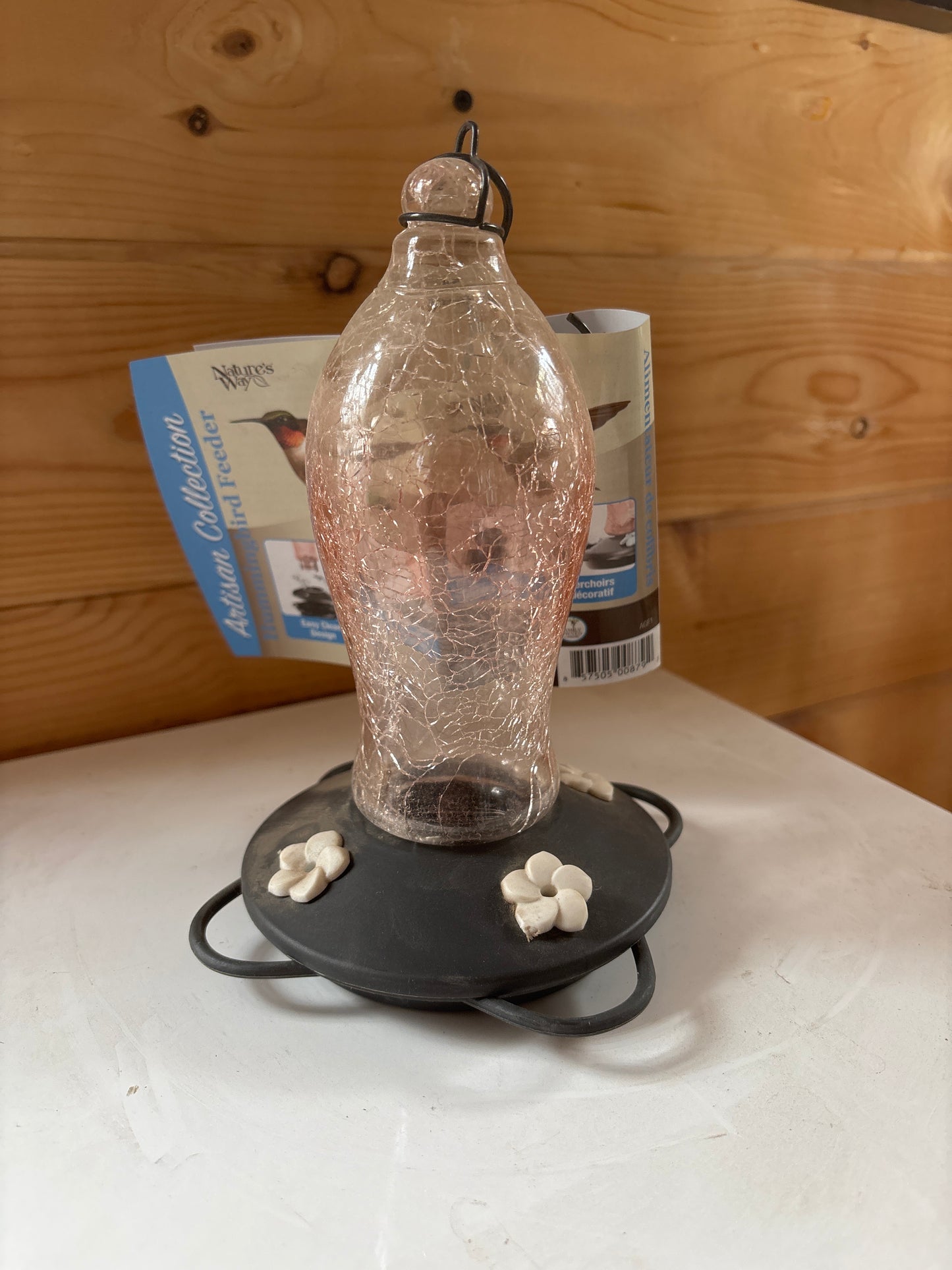 Pink hummingbird feeder