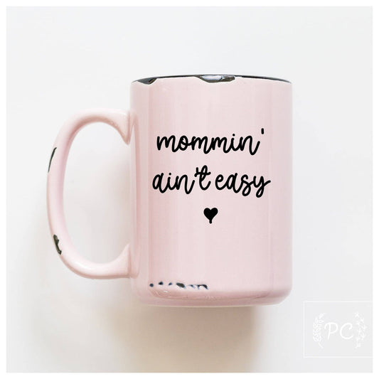 Mommin' aint easy | ceramic mug