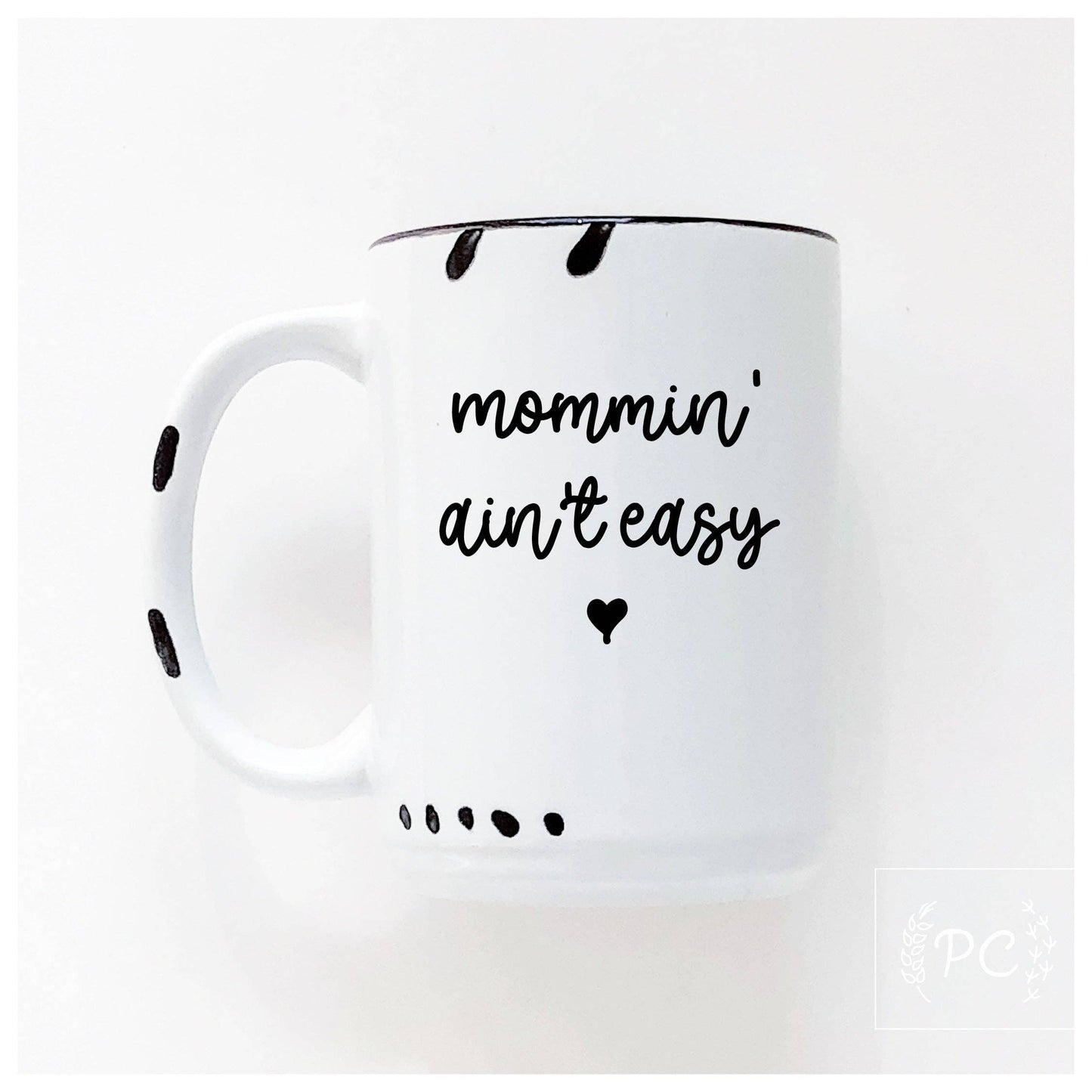 Mommin' aint easy | ceramic mug