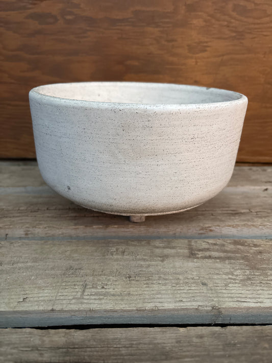 White pot with feet