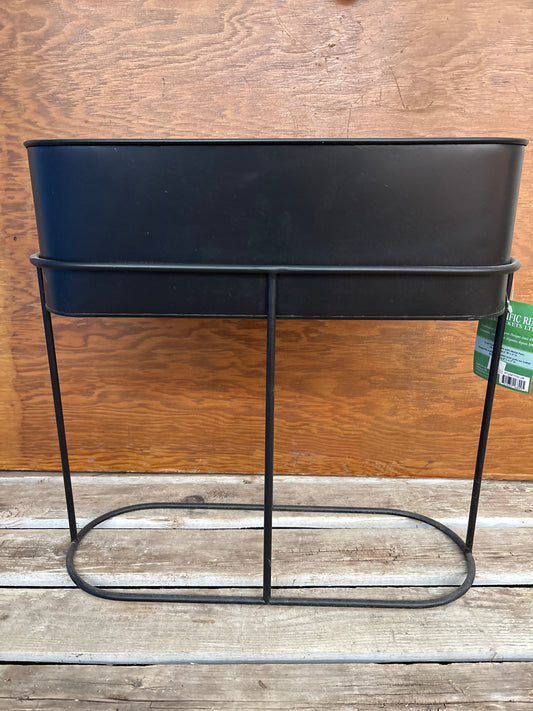 Black pot with stand